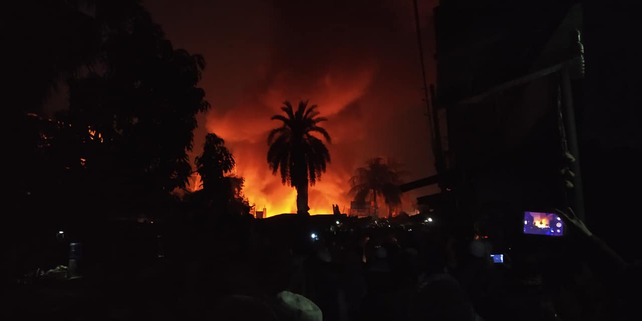 The fire in the adjacent slum in front of the railway line in Uttara